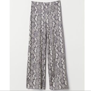Medium / High rise snake skin pants
